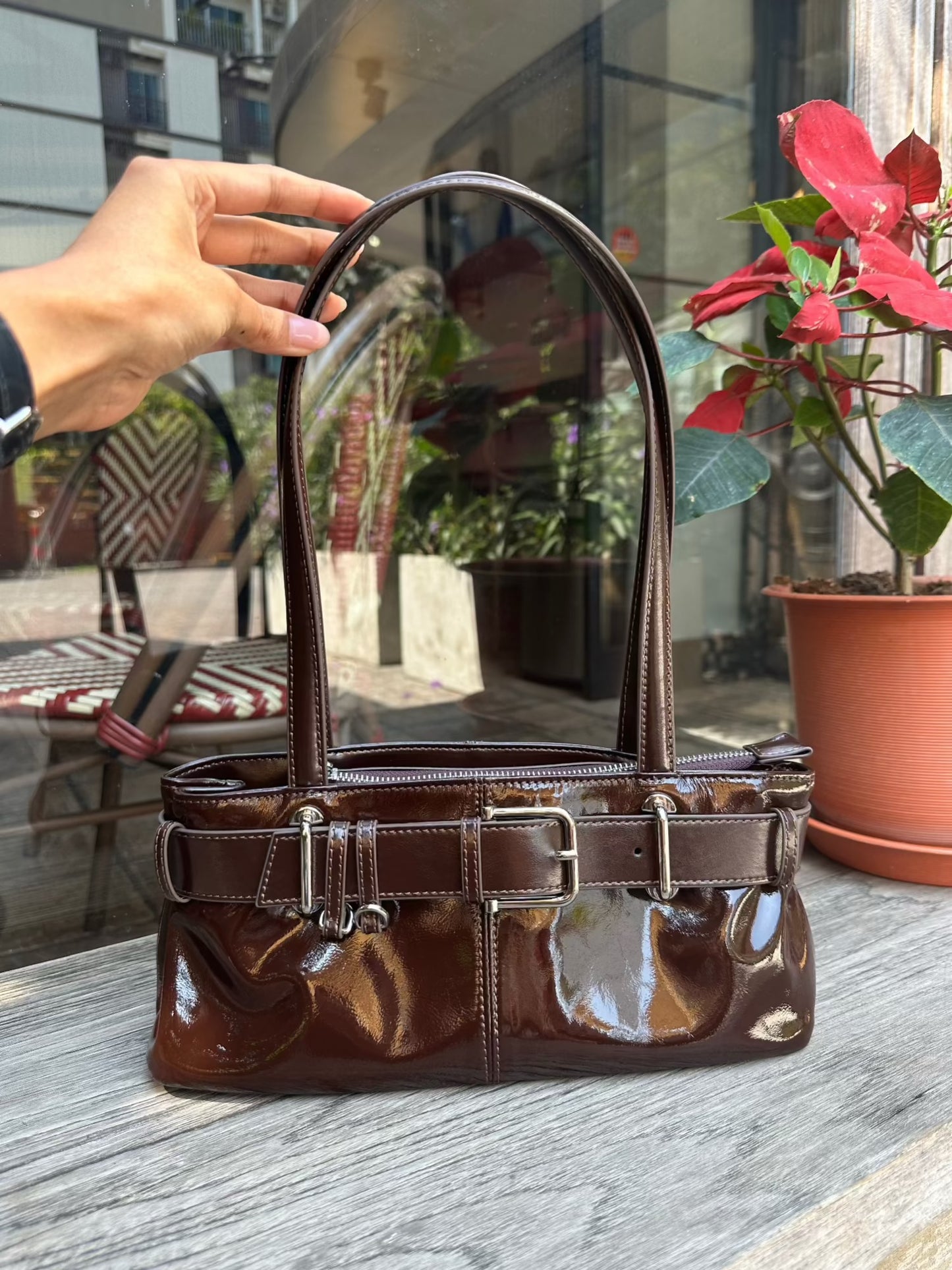Glint - Belted Patent Leather Shoulder Bag