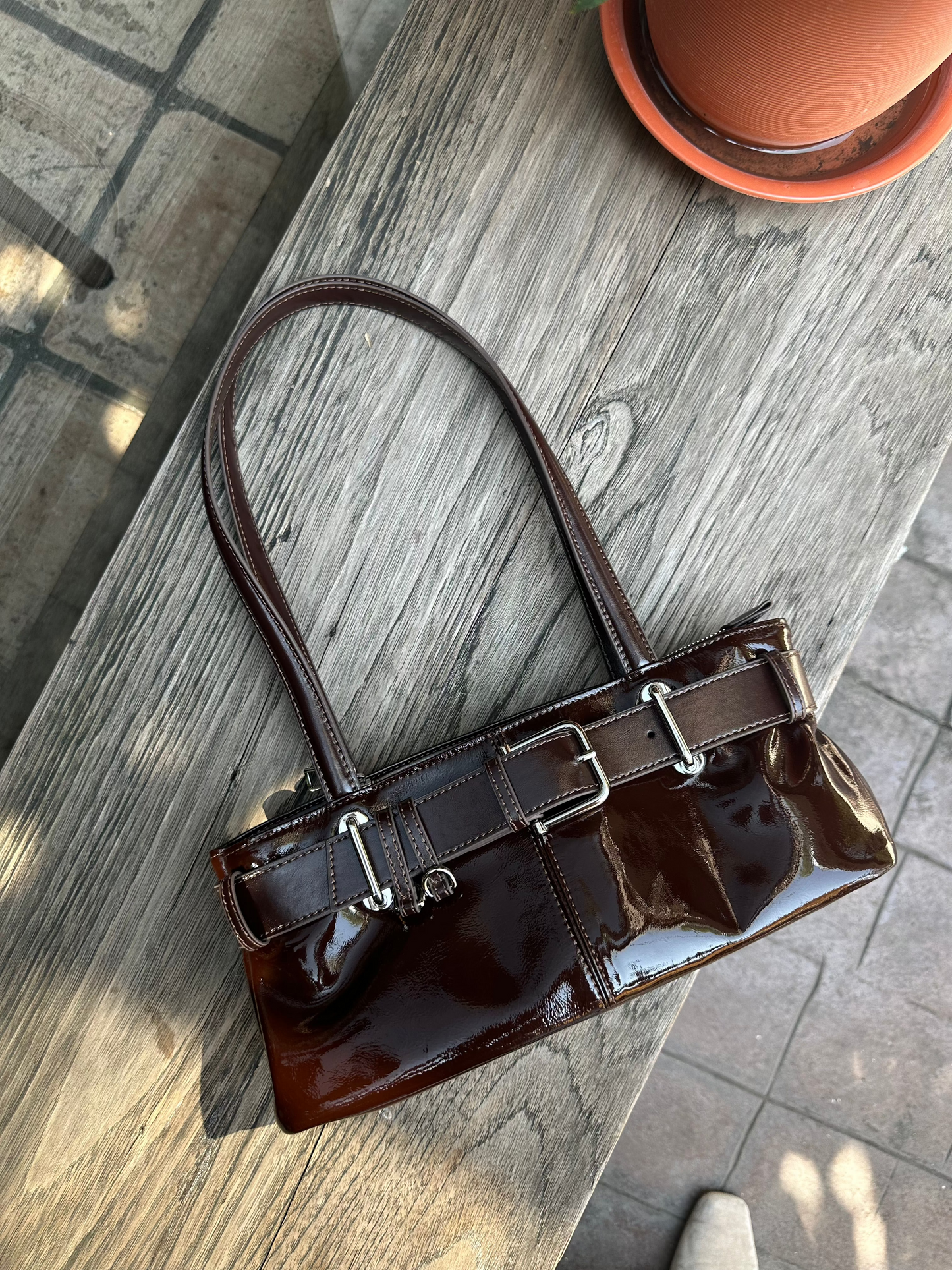 Glint - Belted Patent Leather Shoulder Bag