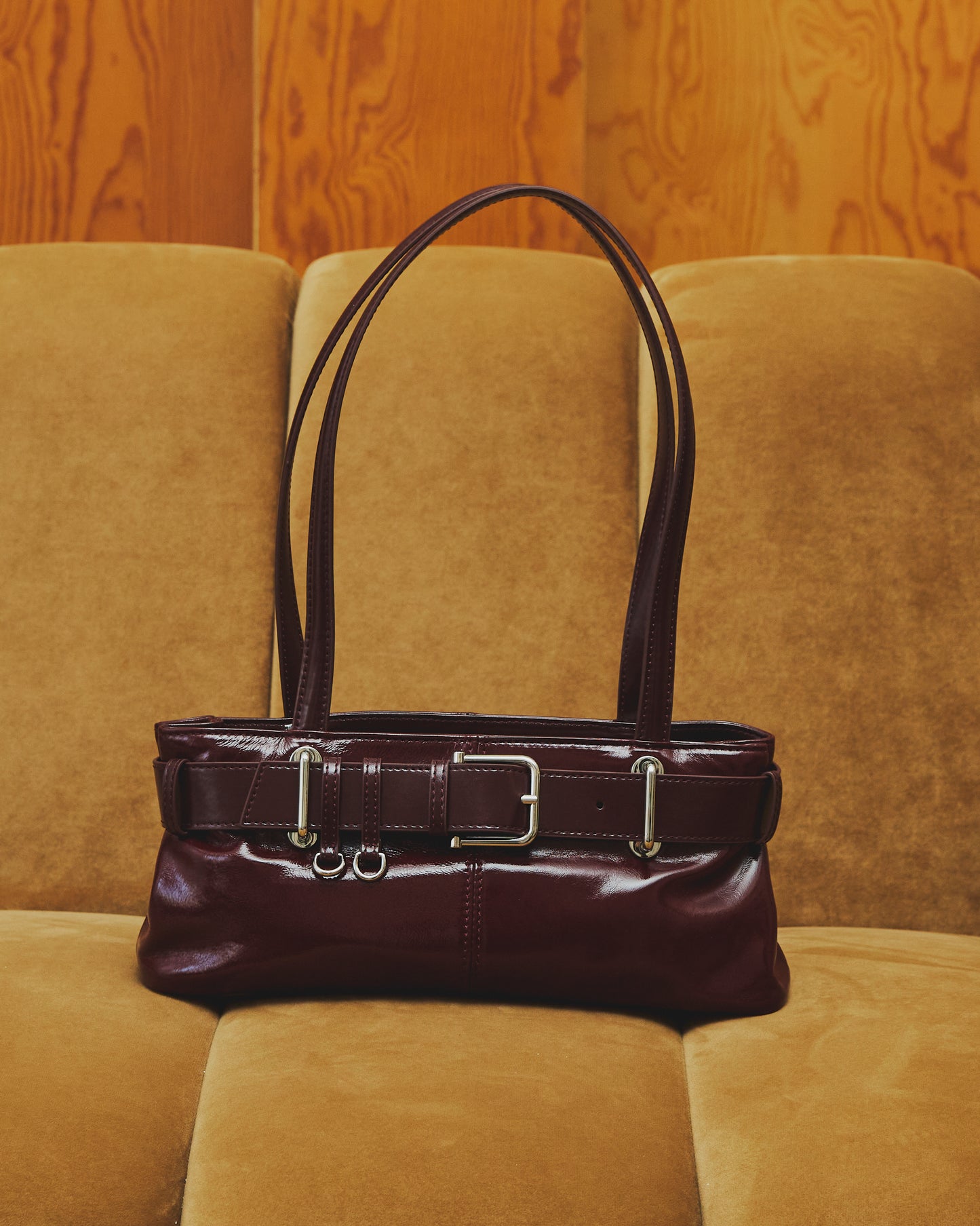 Glint - Belted Patent Leather Shoulder Bag